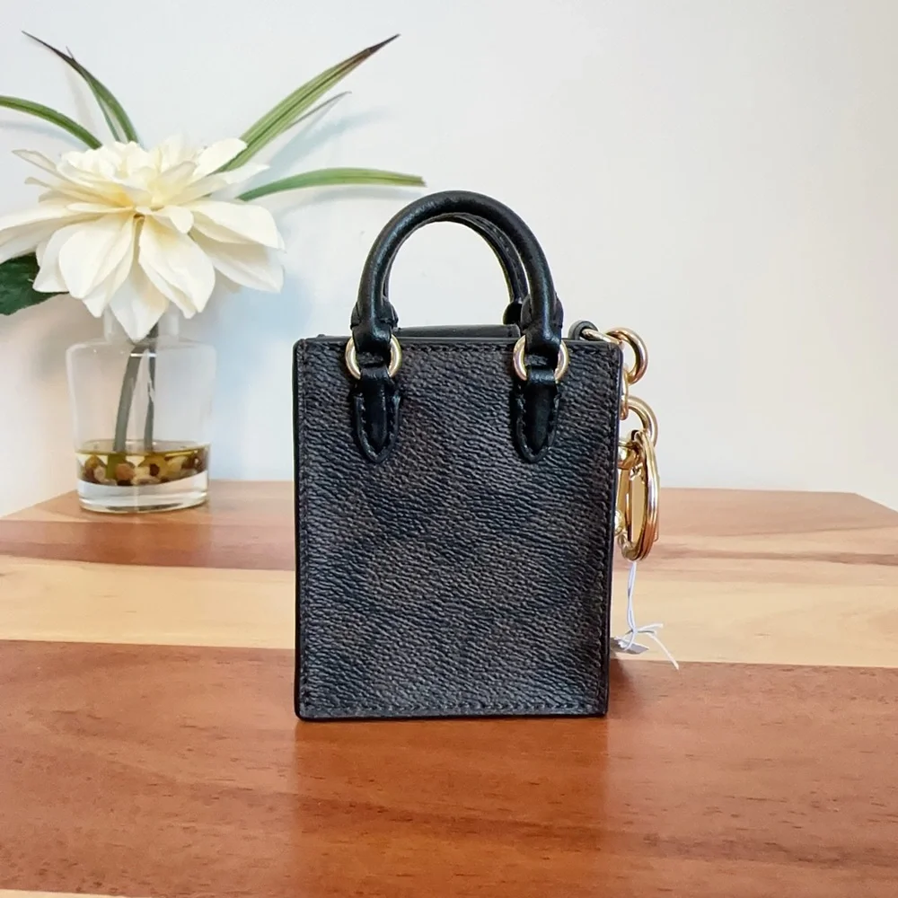 NWT Coach North/South Mini Tote Bag Charm In‎ Signature Canvas